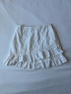 White floral mini linen skirt with ruffle hem